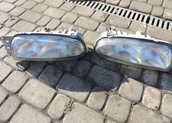 Ford Fiesta MK4 Mazda 121 Reflektor Lampa Przód