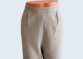 Damskie eleganckie beżowe spodnie materiałowe BmCollection  uniwersalne