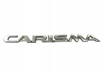 EMBLEMAT MITSUBISHI "CARISMA" ...-2006 NOWY ORYGINALNY MR910444
