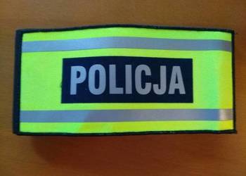 Opaska naramienna odblaskowa z napisem POLICJA na ściągaczu