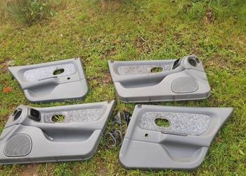 Boczek boczki drzwi komplet Renault Laguna I przedlift 94-98