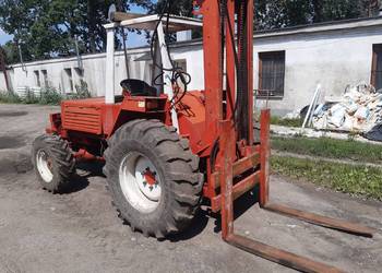 Wózek  widłowy  terenowy manitu  4x4 z łyżką hydrauliczną