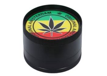 Grinder Młynek do Tytoniu „Original Amsterdam” – liść na tle barw rasta