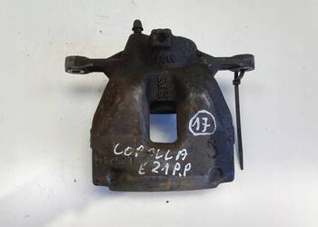 Toyota Corolla XII E21 PRZEDNI ZACISK HAMULCOWY prawy przód PASAŻERA P.P