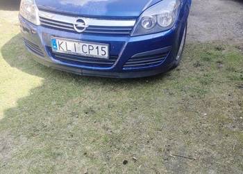 reflektory opel astra h