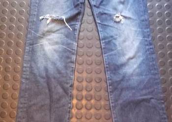 dzinsy Calvin Klein regular slim z dziurami