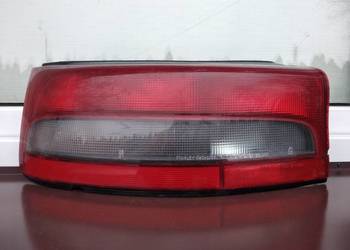 Mazda 323 BG hatchback HB lampa tył tylna lewa oryginał 1989-1994