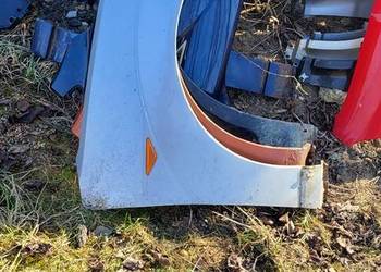 Błotnik  Prawy Ford Fokus MK1 Srebrny   ładny stan Błotnik  Prawy Ford Fokus MK1 Srebrny   ładny stan