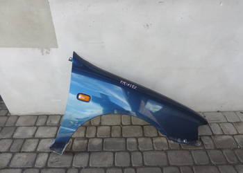 NISSAN PRIMERA P11 BŁOTNIK PRAWY PRZEDNI