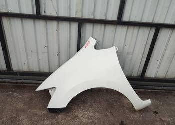 BŁOTNIK LEWY PRZÓD PRZEDNI TOYOTA AURIS 1 I LIFT BIALY