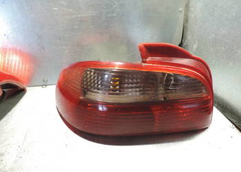 LAMPA LEWA LEWY TYŁ TOYOTA AVENSIS T22 SEDAN