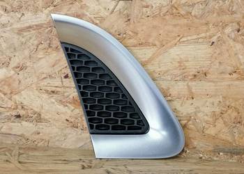 SAAB 9-5 II OZDOBNA ZAŚLEPKA BŁOTNIKA LEWY PRZÓD