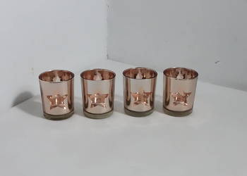 Komplet 4 świeczników – Rose Gold z wyciętą gwiazdą | Nowoczesne