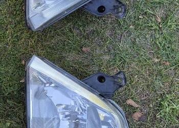 reflektory.lampy meriva a fl.oryg .GM.kpl eu.bez wad.93321052,93321053