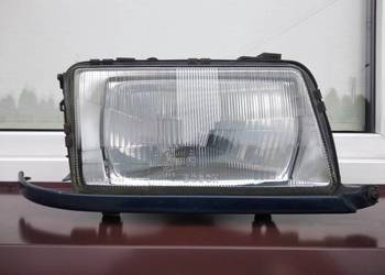 Audi 80 B4 lampa przednia prawa reflektor przód pasażera Bosch listwa