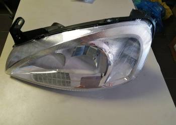 OPEL CORSA C REFLEKTOR LEWY BOSCH