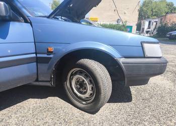 Błotnik prawy corolla 83-88 e8