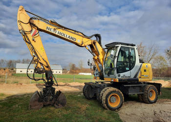 Koparka kołowa NEW HOLLAND WE150C, 4x4 (2012 r. / 15.3 t)