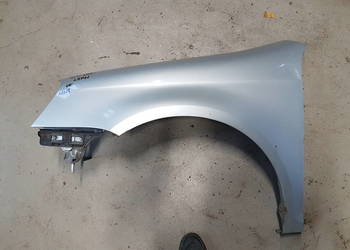 VW GOLF V KOMBI JETTA BLOTNIK LEWY PRZOD SREBRNY  LA7W