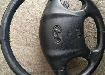 Kierownica Tucson  Hyundai skórzana do regeneracji podłokietnik