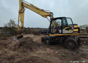 Koparka kołowa JCB js 130 w cat case komatsu new Holland doosan Volvo