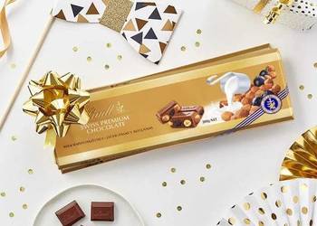 Czekolada premium o smaku mleka, rodzynek i chrupek X 4