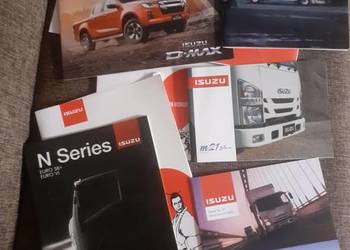 Prospekty Isuzu oraz nowa smycz.