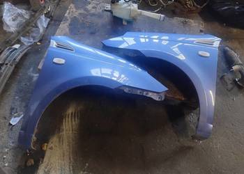 Błotnik Przedni Lewy Lub Prawy Lak 20U Chevrolet Aveo T 255 HB Wysyłka