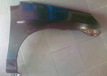 SUZUKI LIANA 01-07 BŁOTNIK PR.+OTWORY NA NAKŁADKĘ