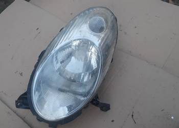 lampa przednia lewa Nissan Micra k12 89007101 oryginał