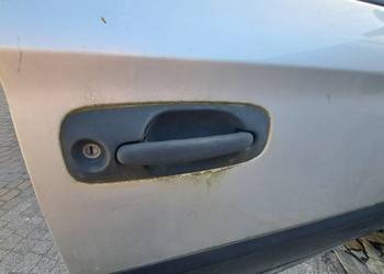 Klamka chrysler grand Voyager Caravan IV prawa
