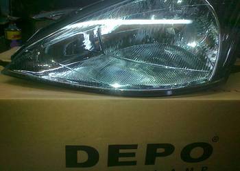 FORD FOCUS 98/01 REFLEKTOR H4 NOWY DEPO  LE