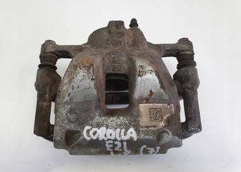 Toyota Corolla XII E21 PRZEDNI ZACISK HAMULCOWY lewy przód KIEROWCY