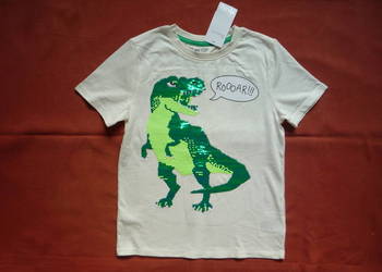Nowa H&M r. 134/140 Kremowa koszulka dinozaur Odwracające cekiny