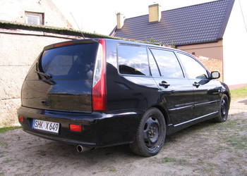 Lampa tył lewa / prawa Lancer VII Kombi 03-05
