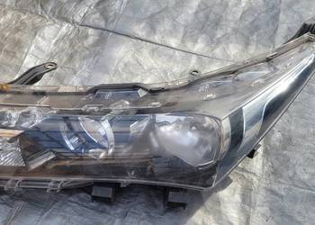 REFLEKTOR LAMPA LEWY PRZÓD TOYOTA COROLLA E16