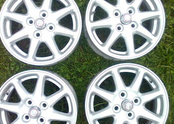 Felgi aluminiowe 14 Toyota Yaris Corolla plus nakrętki