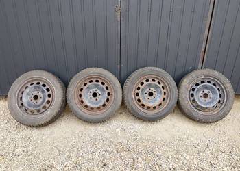Felgi stalowe z oponami + kołpaki