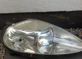 Reflektor przedni Fiat Grande lewa