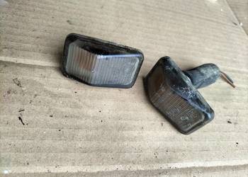 GOLF II 2 JETTA 2  KIERUNKOWSKAZ PRAWY + LEWY CZARNY PRZYCIEMNIANY HELLA