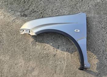 Suzuki Ignis MH SUBARU G3X JUSTY ZU1 błotnik lewy przód z listwą