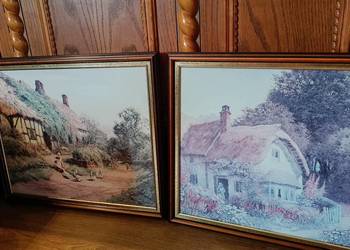 Dwa oleodruki " Wiejskie chaty" w jednakowych ramach