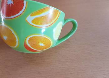 filiżanka kubeczek kubek lipton w owoce pomarańcze  cytryny