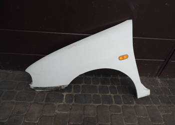 VOLKSWAGEN CADDY II BŁOTNIK LEWY PRZÓD