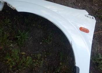 Błotnik przedni lewy FORD FIESTA mk6 biały bez malowania