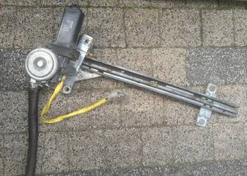 Mechanizm opuszczania szyby prawy p Mazda 323F