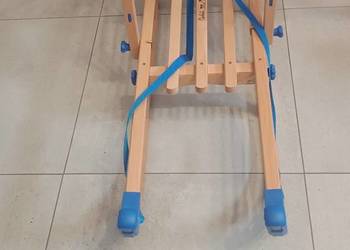 Sanki z oparciem firma Spolnota TUV