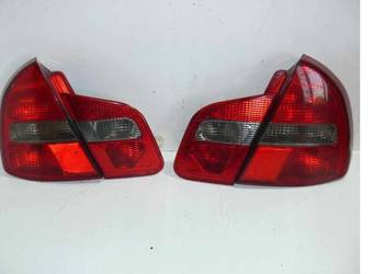 LAMPY TYLNE W BŁOTNIK I KLAPĘ DO  MITSUBISHI CARISMA LIFT 20