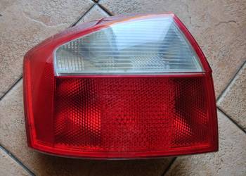 Lampa lewa tył audi a4 b6 hella sedan