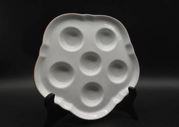 Talerz do serwowania jajek lub ślimaków marki Walküre.